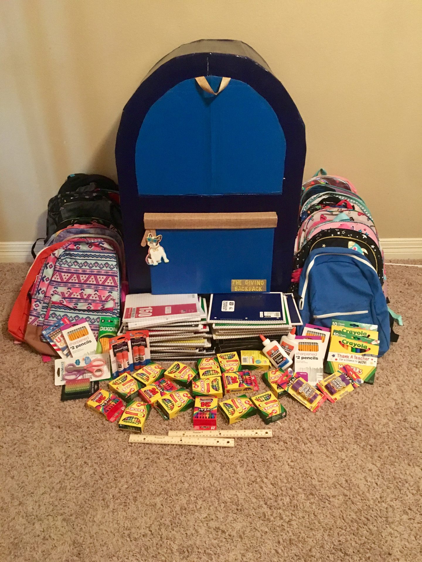 Local family makes huge backpack for supply drive!